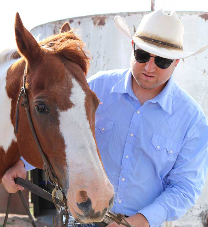 ET-Optometrist-Dr-Philpy-with-horse.jpg